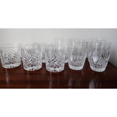 35 - A set of five Waterford crystal whiskey tumblers, 10 cms high and five cut glass water goblets.
