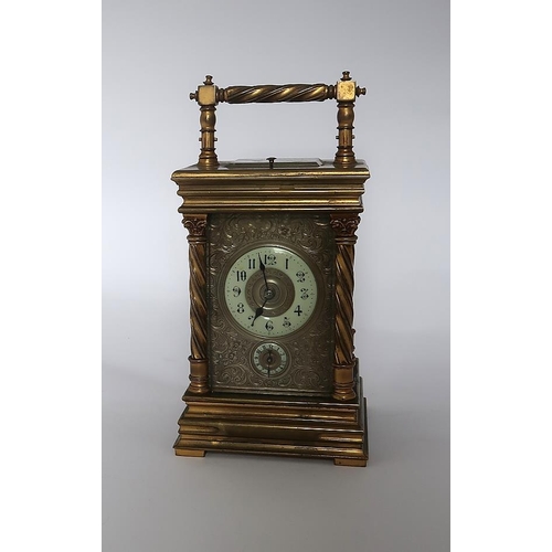 42 - A Victorian brass carriage clock in the manner of Fratelli Rosetti, the face applied with scrolls an... 