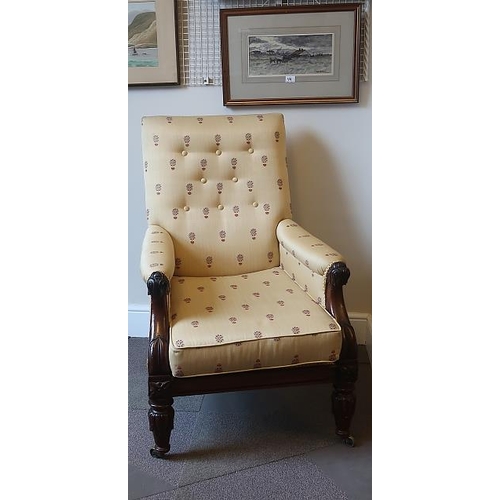48 - A William IV mahogany library armchair, with button upholstered back, loose cushion, raised on carve... 