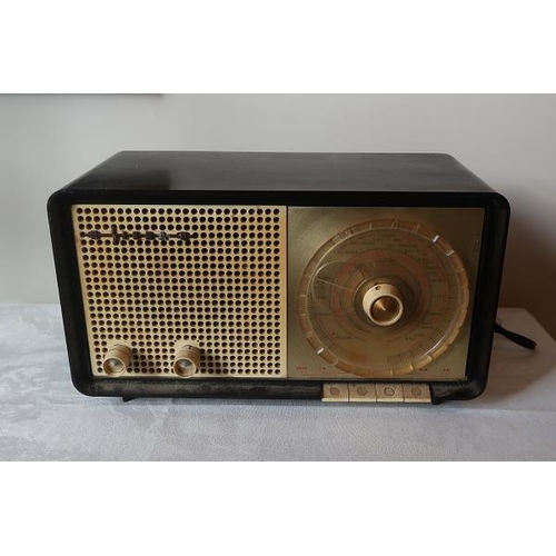 8 - A Siera 220 Volt bakelite radio.