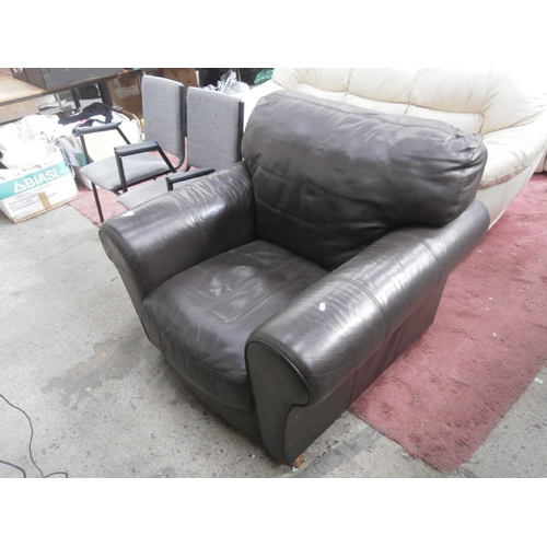 400 - Brown leather armchair