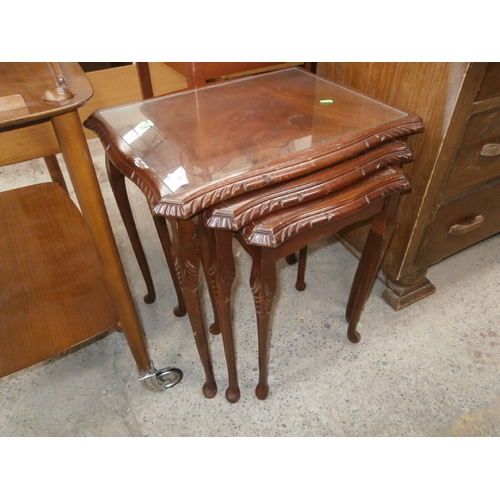 508 - Nest of three glass topped occasional tables