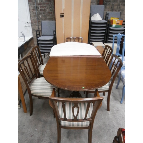 509 - Mahogany extending dining table and six chairs