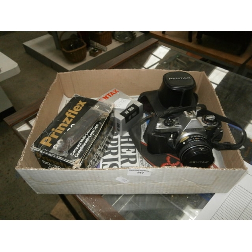 147 - Pentax camera with 2 accessories