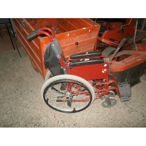 125 - Red wheelchair