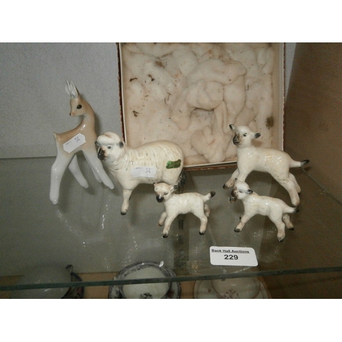 229 - 4 Beswick sheep and another figure