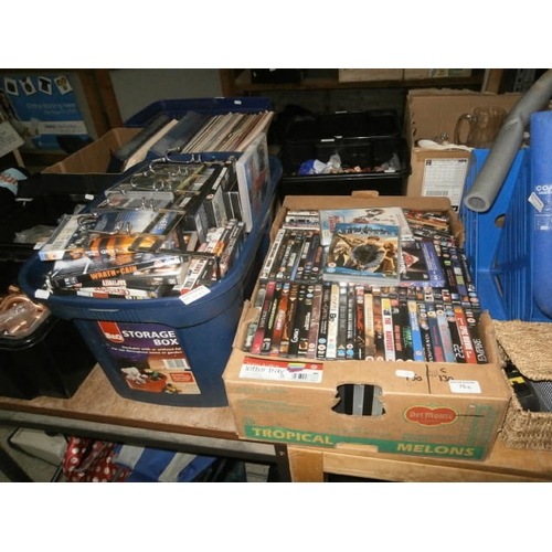 75 - 2 boxes of DVDs