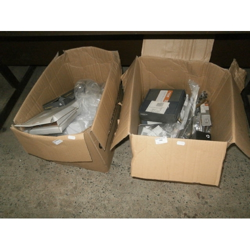 144 - Two boxes of door handles