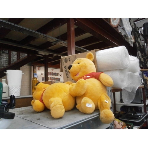 10 - Two Winnie the Pooh soft toys