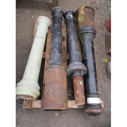 28 - 4 vintage cast iron posts