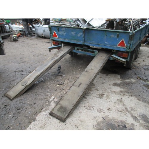 29 - Galvanised metal twin axle trailer with ramps. All lights working, needs repair to floor - boards in... 