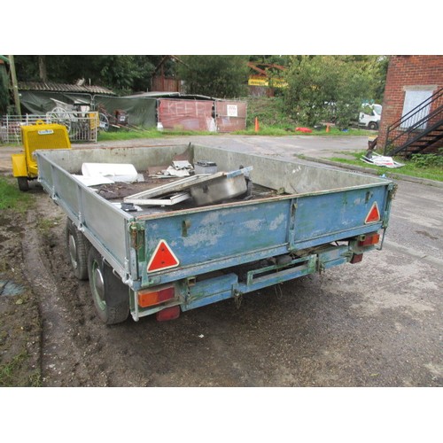 29 - Galvanised metal twin axle trailer with ramps. All lights working, needs repair to floor - boards in... 