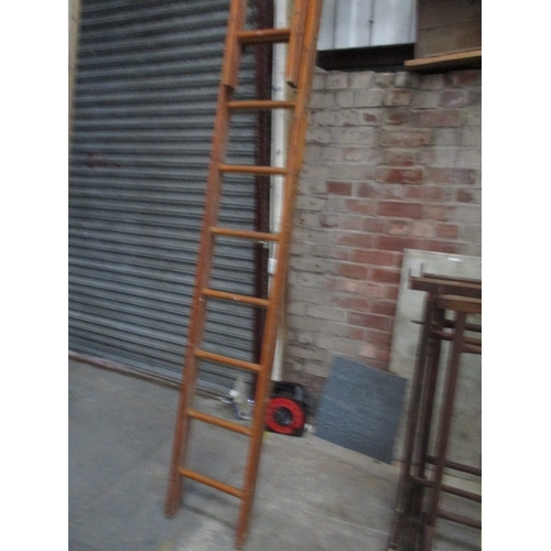 1002 - Double wooden extending ladder in good condition