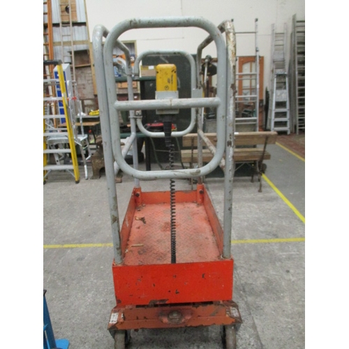 1087 - 240Kg elevating platform, 10ft lift, 240v charging. In working order