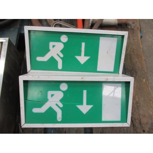 1041 - 4 Emergency exit signs (1 as found) and a glass fronted 1st Aid box with key