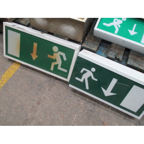 1041 - 4 Emergency exit signs (1 as found) and a glass fronted 1st Aid box with key