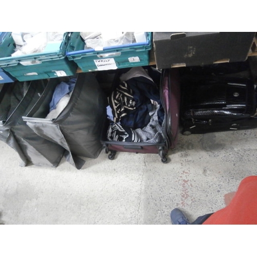 134 - Two suitcases and two laundry baskets containing clothing and bedding