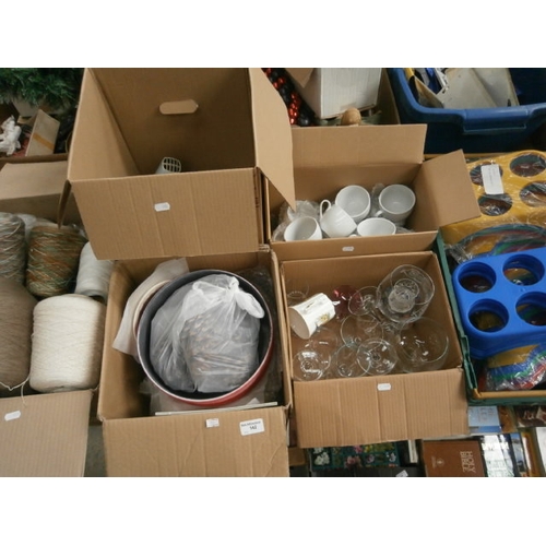 142 - Four boxes inc glassware, mugs, old hair dryers, crockery, etc