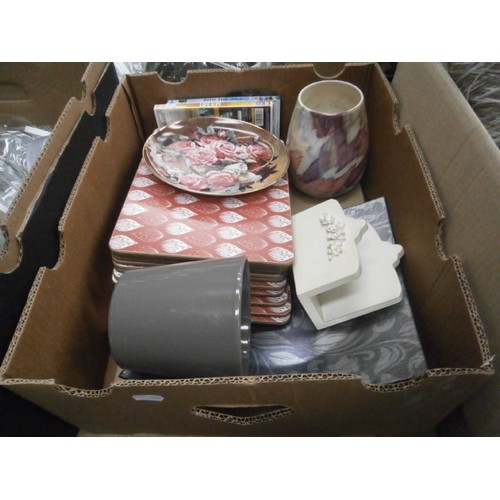 140 - Four boxes inc mugs, wigs, placemats, ceramic pots, etc