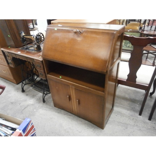 716 - Fall front bureau on double cupboard