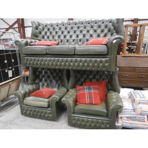 610 - Chesterfield green buttoned leather wing back 3 piece suite - some wear to arms