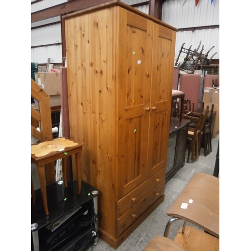 618 - 2 door pine wardrobe on double drawers