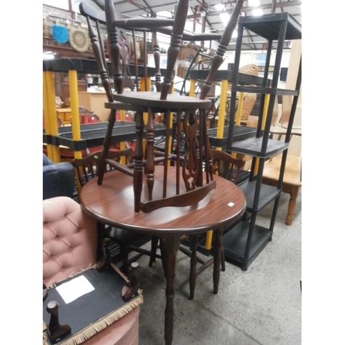 628 - Circular mahogany table and 4 x matching chairs