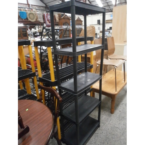 629 - 2 x stacking plastic shelf units