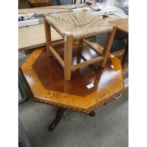 693 - Octagonal tripod table and a string seat stool