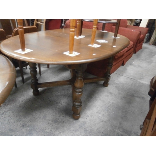 715 - Large ERCOL extending dining table with elm top