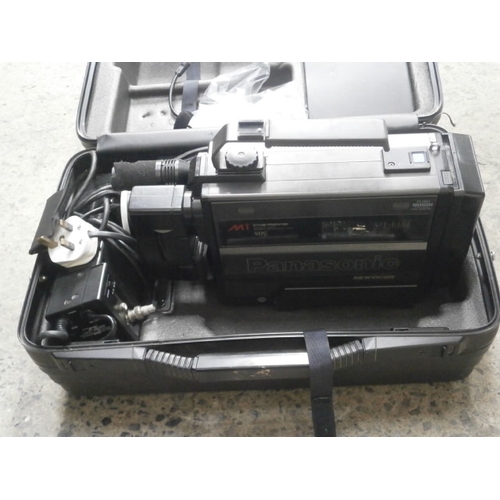 328 - Panasonic VHS Movie camcorder with case and accessories