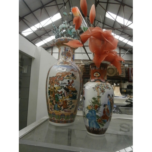 366 - Two decorative oriental vases