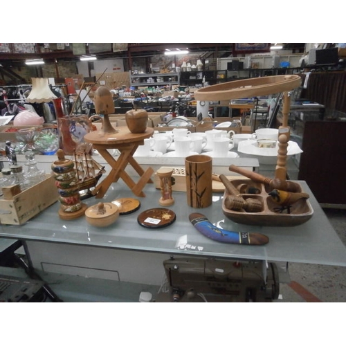 384 - Collection of wooden items inc small table, cross stitch stand, napkin rings, etc