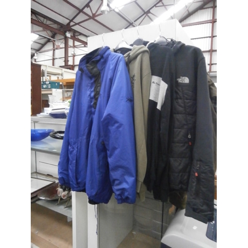 423 - Two jackets and two jumpers inc Regatta, The North Face, Gym King, Ben Sherman.