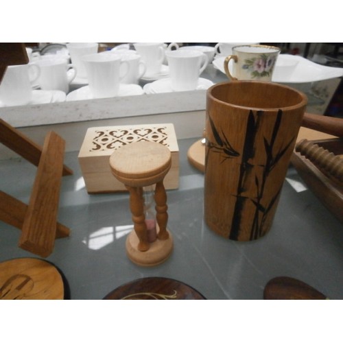 384 - Collection of wooden items inc small table, cross stitch stand, napkin rings, etc