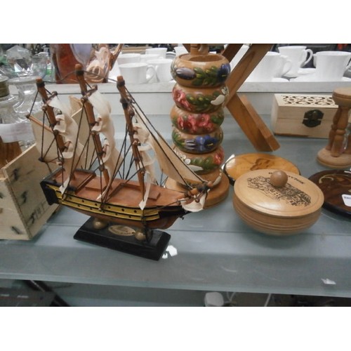 384 - Collection of wooden items inc small table, cross stitch stand, napkin rings, etc