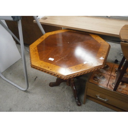 693 - Octagonal tripod table and a string seat stool