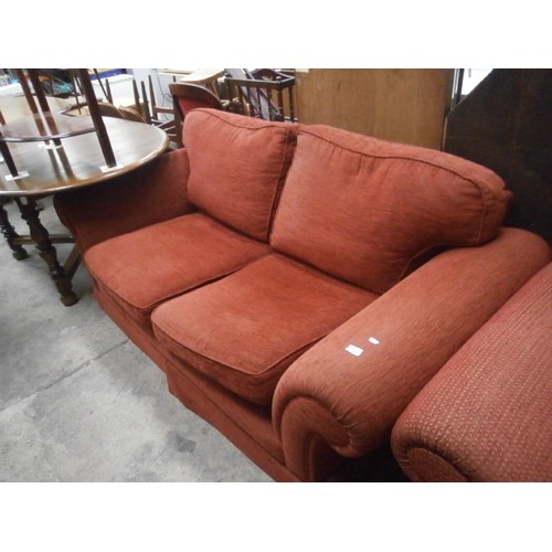 716 - Large upholstered settee and a similar armchair