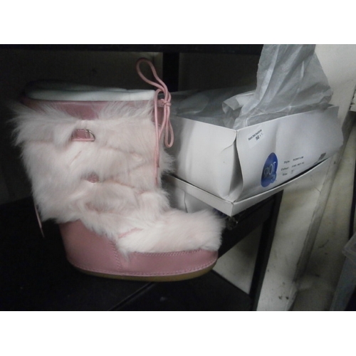 56 - Two pairs of boxed ladies snow boots size 5 1/2 and 7 1/2