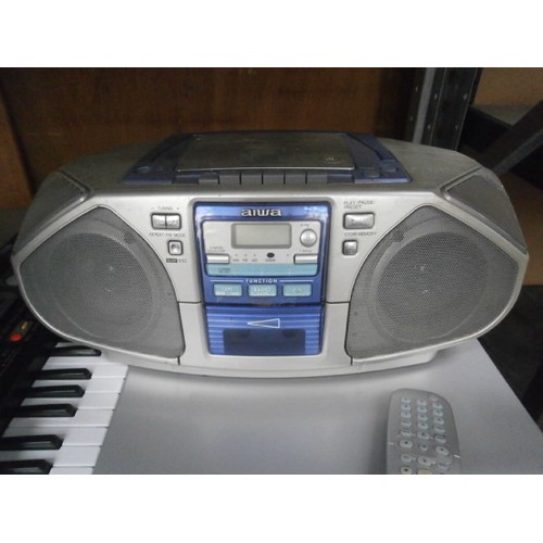 14 - Lot including Aiwa stereo cassette player, compact disc player and music workstation keyboard.