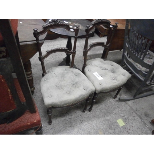 640 - Pair of ornately carved antique bedroom chairs with upholstered seats