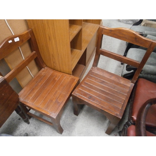 642 - Pair of solid wooden dining chairs