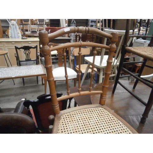 648 - Set of 3 x bamboo style spindle back chairs with bergere seats