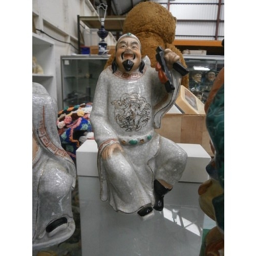 380 - Four oriental figurines, two have damage