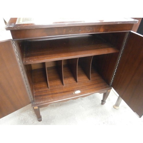 673 - 2 door leather topped ex music centre cabinet