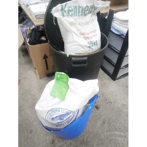 157 - Large black bin and small plastic bucket containing bird  feed