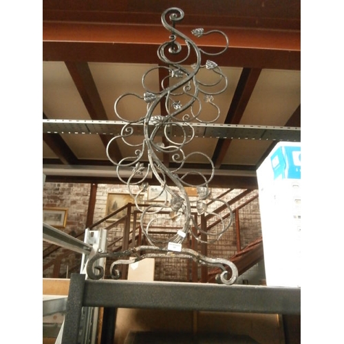 18 - Cast iron wine rack