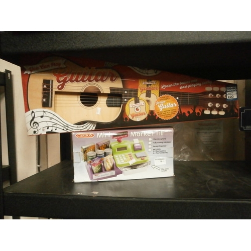 71 - Lot inc kids guitar and market till