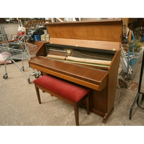 606 - EAVESTAFF Mini piano with service history and stool