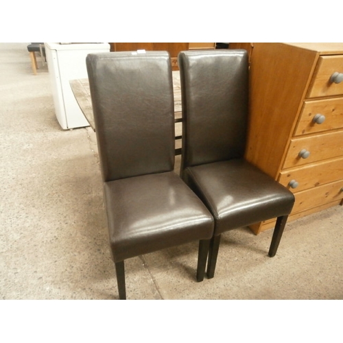 634 - Pair of modern faux leather dining chairs